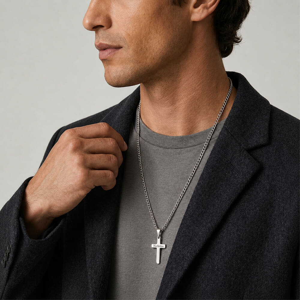 Man models the Custom Cross Necklace, emphasizing its bold statement.