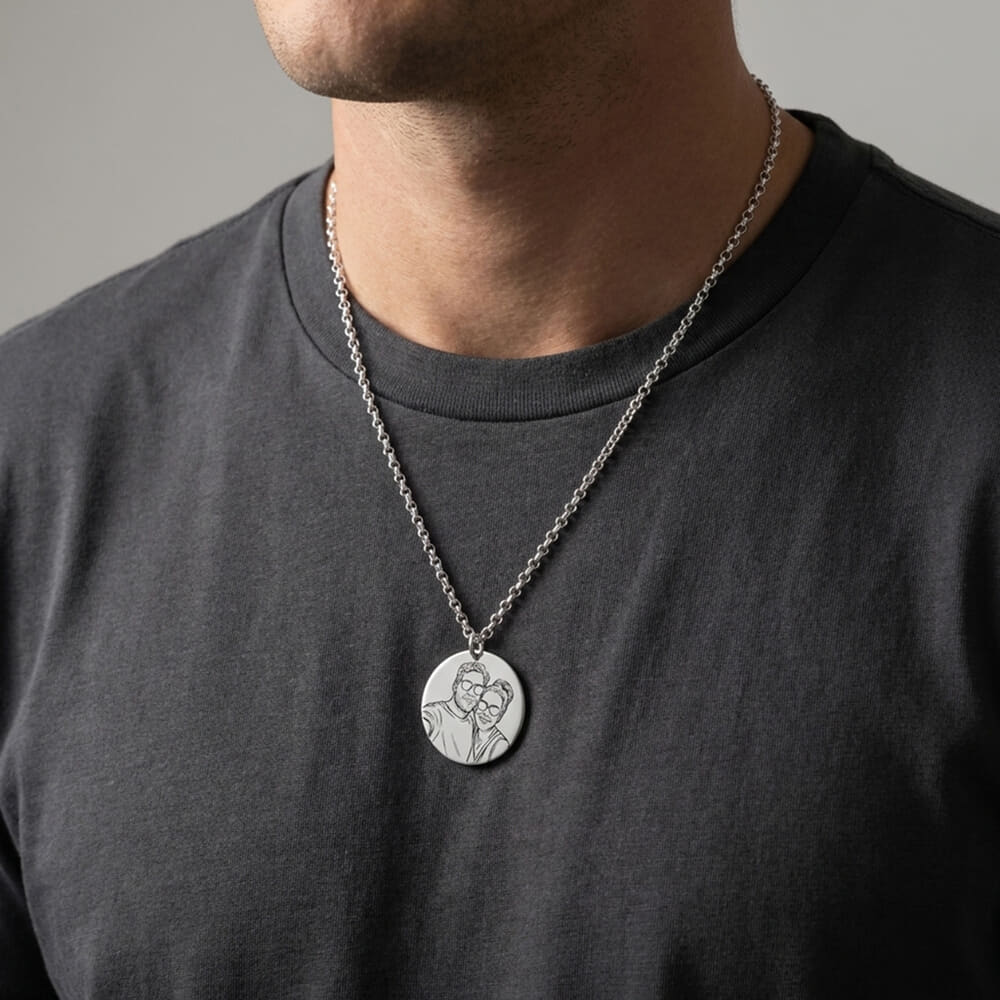 Man in a t-shirt wearing a Personalized Photo Disc Necklace with a couple's photo