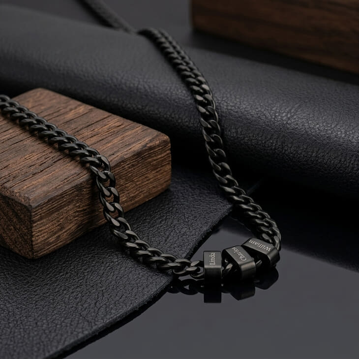 Elegant presentation of a black dad necklace on stylish materials