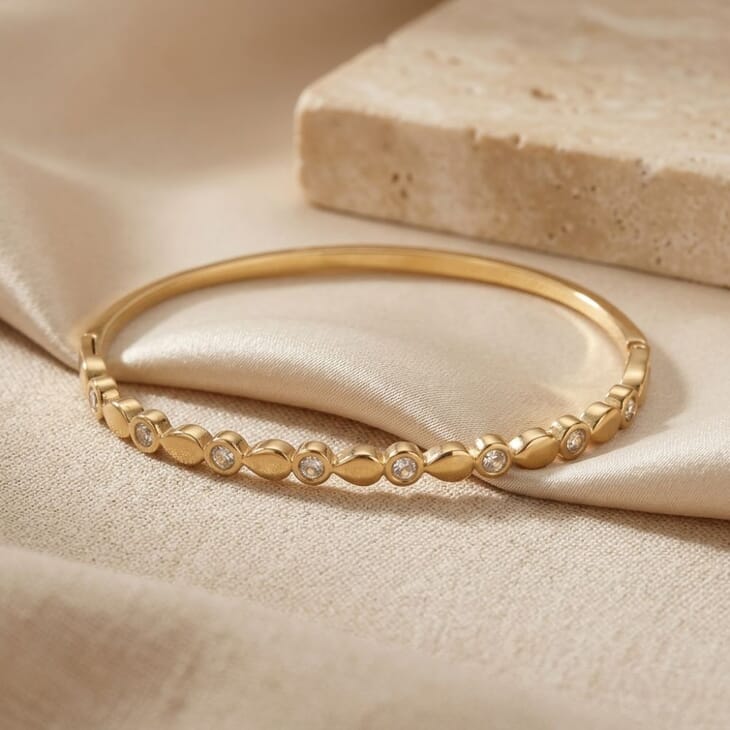 Gold Alternating CZ Bangle Bracelet highlighting its chic marquise cubic zirconia