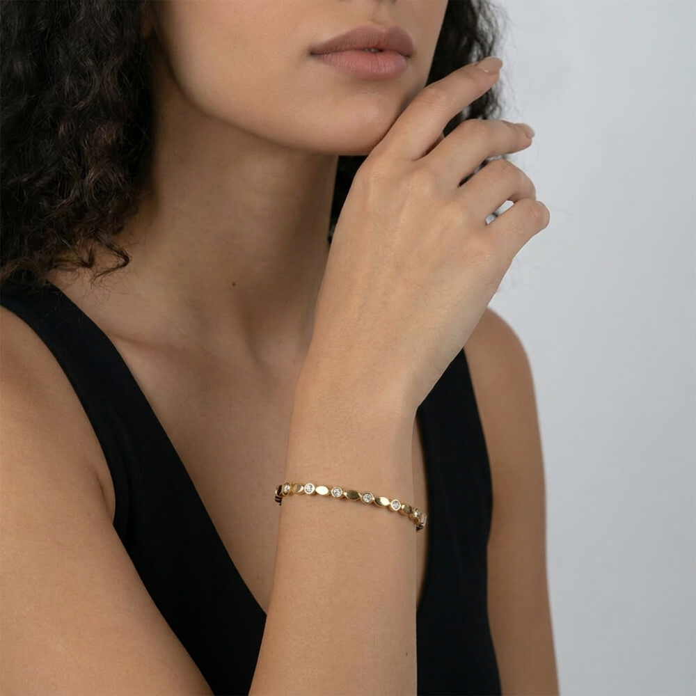 Chic model adorned with the Alternating CZ Bangle Bracelet, emphasizing its elegant design