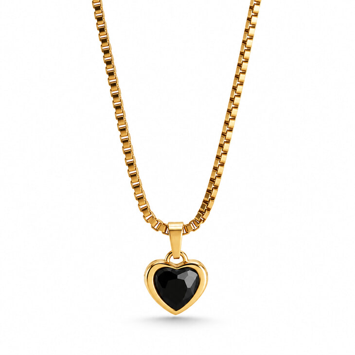 Gold heart necklace adorned with a stunning black gemstone charm