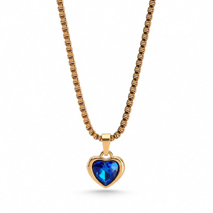 Gold heart necklace adorned with an eye-catching blue gemstone